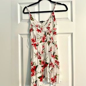 White dress with red/white/green flower pattern